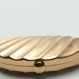 Mango clutch and pochettes fusili in gold
