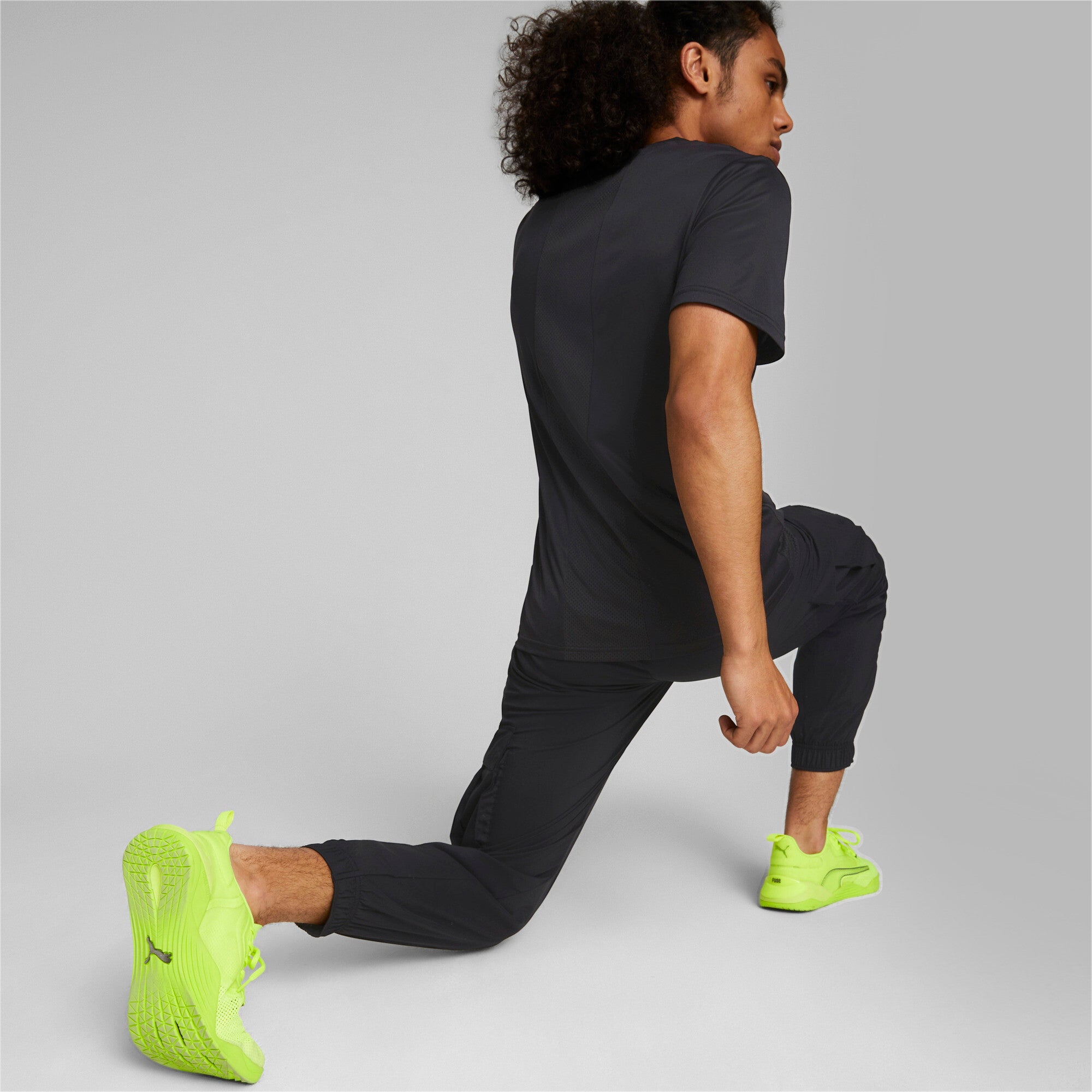 Puma training favourite woven cargo pants in black - Model Shot 03