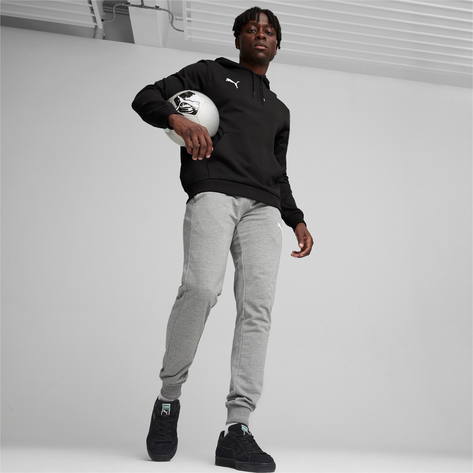 Puma teamGOAL casuals football hoodie in black and white - Model Shot 03
