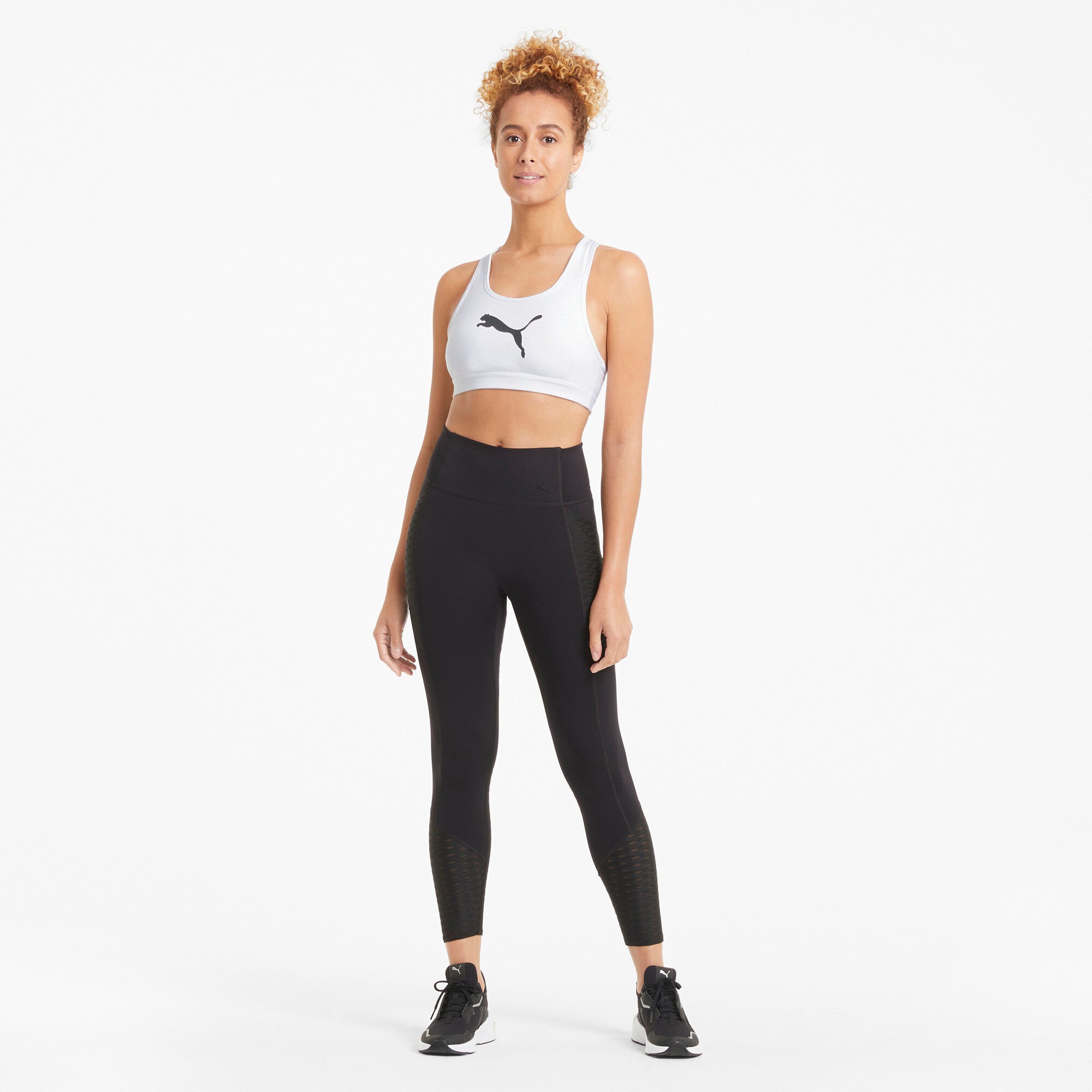 Puma mid impact 4keeps training bra in black - Model Shot 03