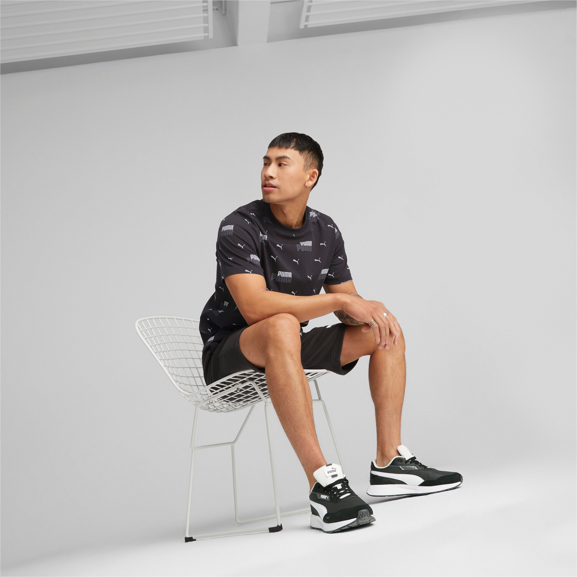 Puma essentials+ logo power printed tee men in black - Model Shot 02