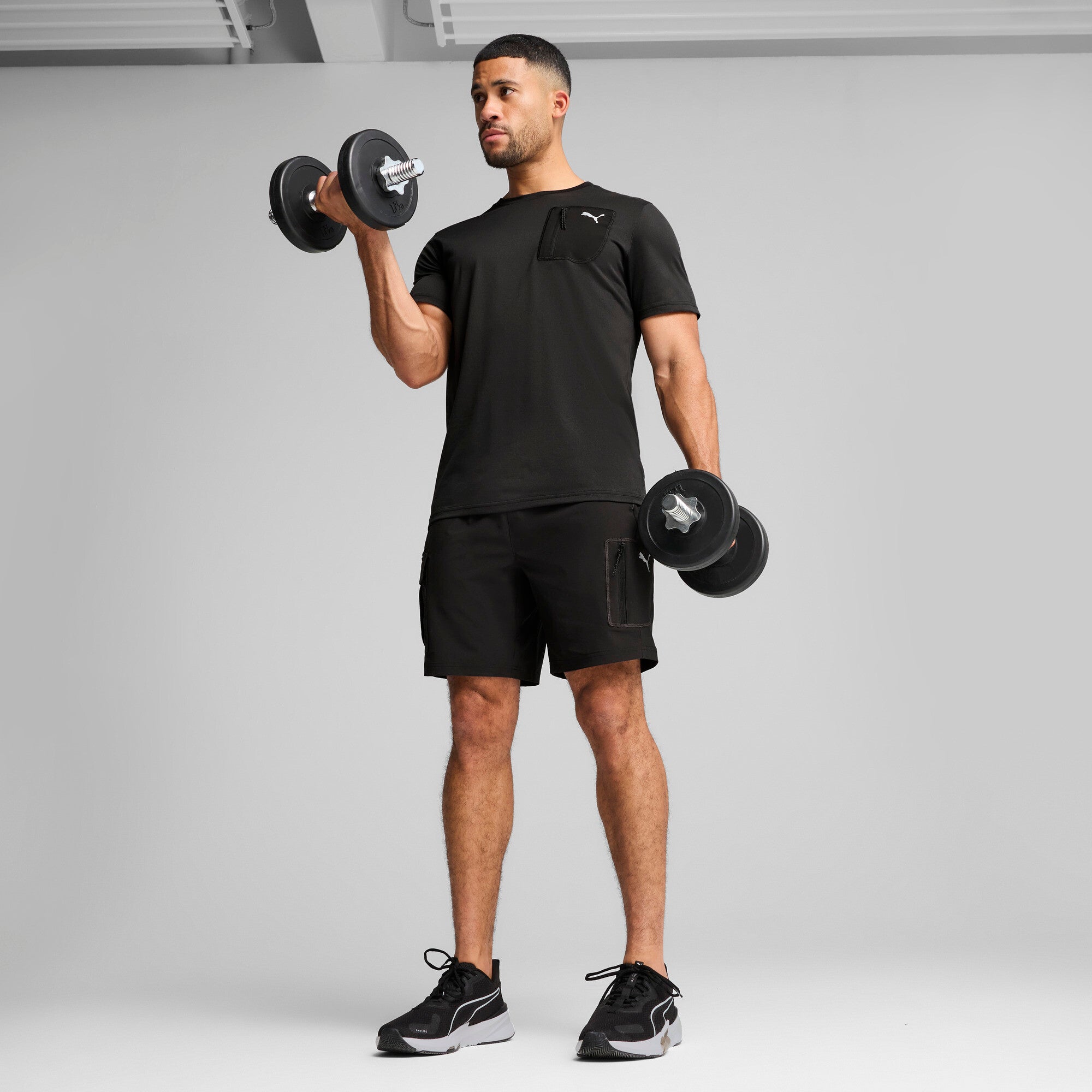 Puma flex pocket tee in black - Model Shot 03