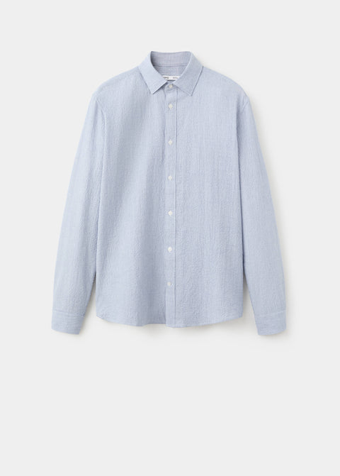 Mango shirt kissos in carpet
