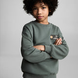 Mango sweatshirt shot in moss