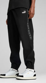PUMA ESSENTIALS tape woven pants in black - Image 1