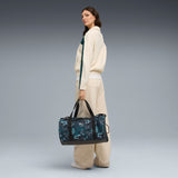 PUMA ESSENTIALS training green terrains 28.5L barrel bag in green terrain - Image 1