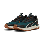 PUMA Extend lite trail running shoes in green terrain - Image 1