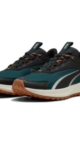 PUMA Extend lite trail running shoes in green terrain - Image 1