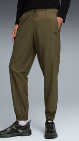 PUMA PUMATECH woven cargo pants men in loden green