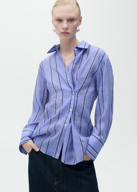 Mango shirt inma in carpet