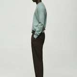 Mango sweater cash in water