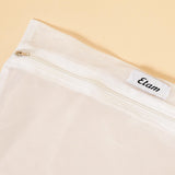 Etam pochette - lavage in blanc