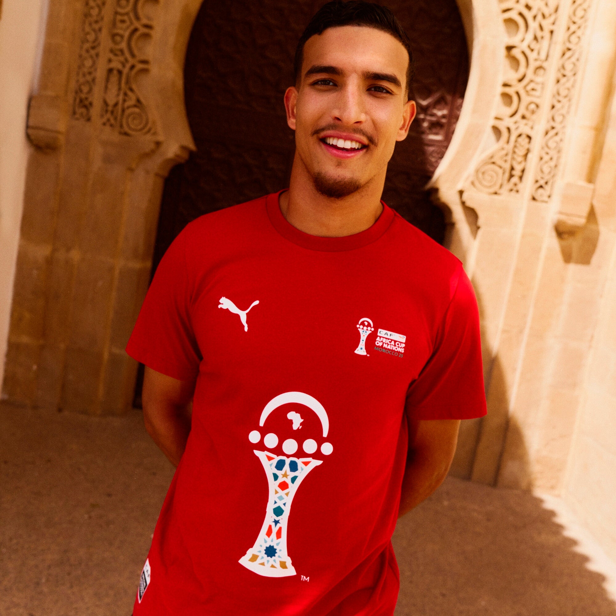 PUMA TotalEnergies CAF Africa Cup of Nations 2025 trophy tee in dark cherry - Model Shot 01