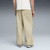 PUMA wardrobe essentials oversized parachute pants men in pebble gray — model shot 2
