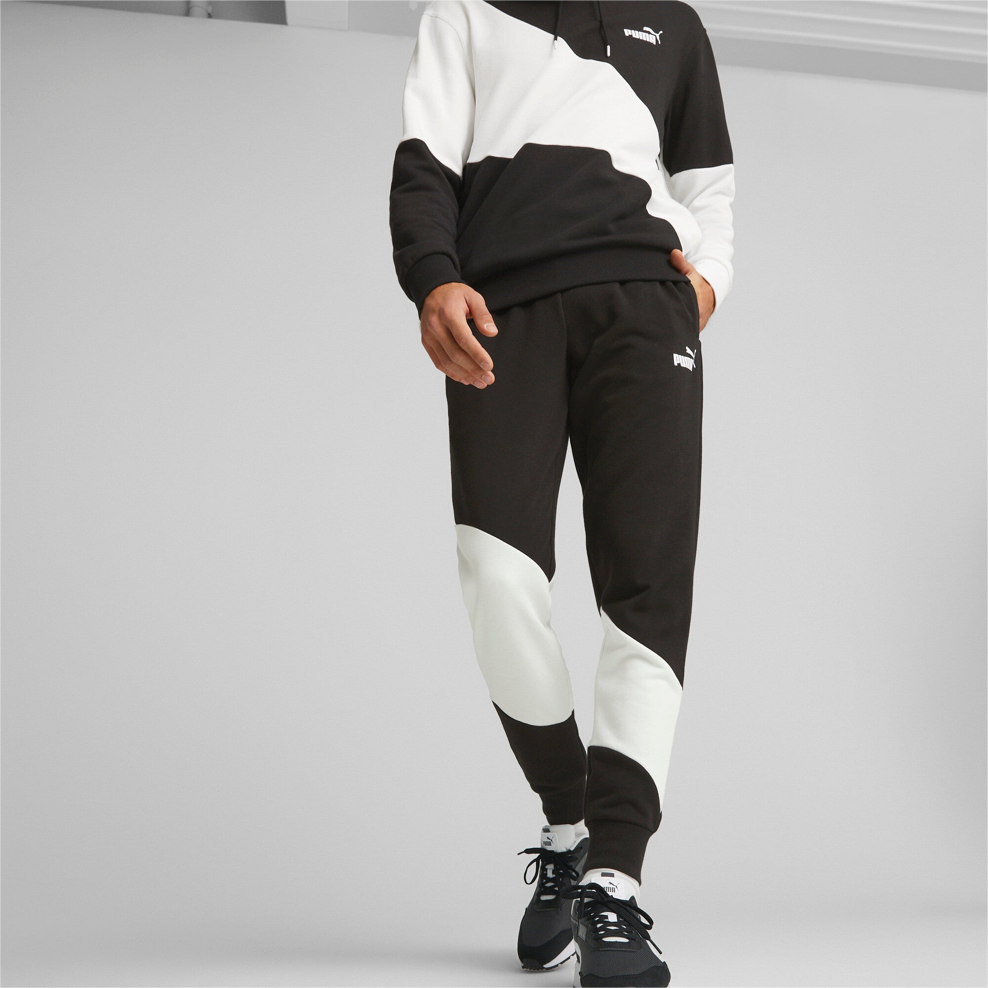 Puma power cat sweatpants in black - Model Shot 01
