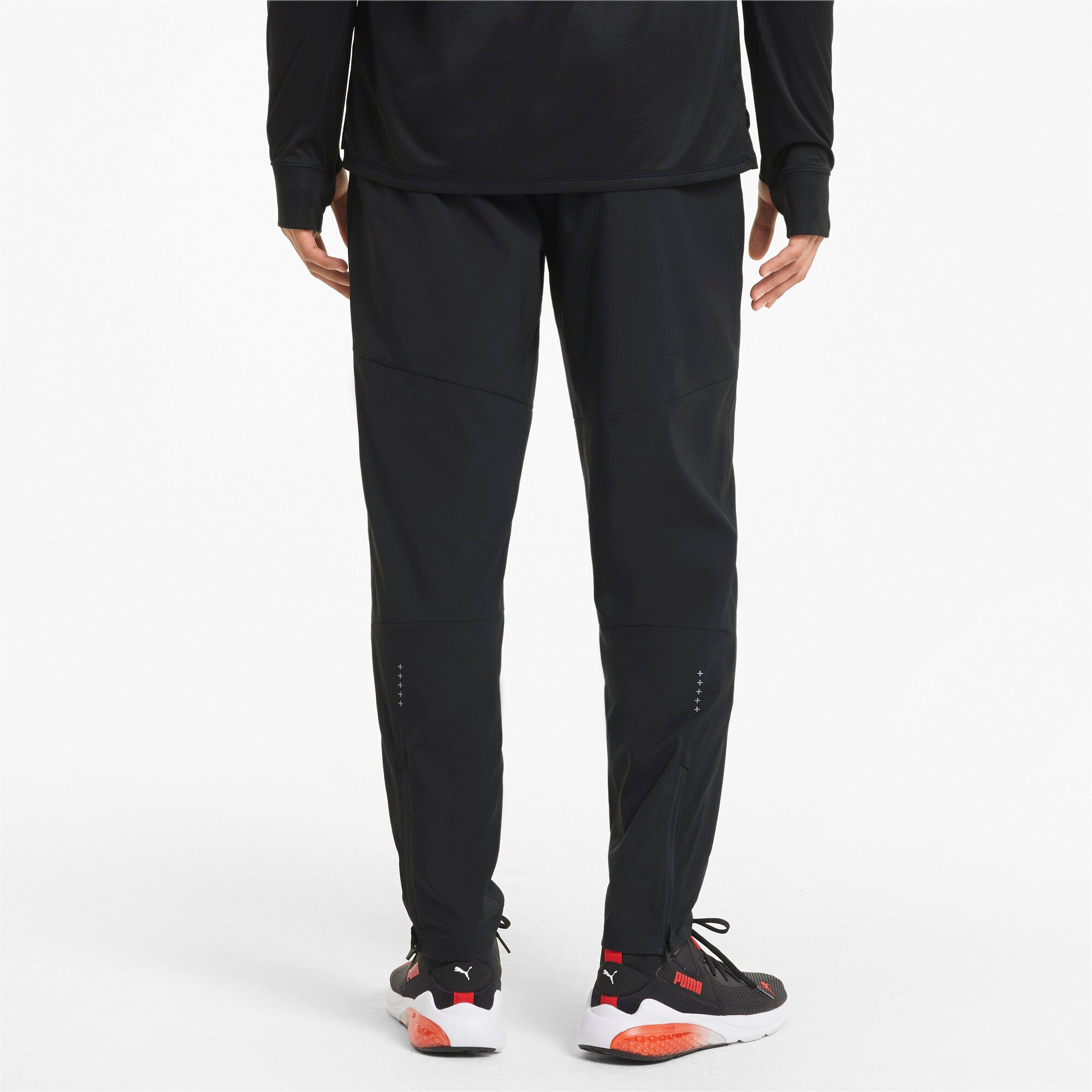 Puma running favourite tapered pants in black - Model Shot 02