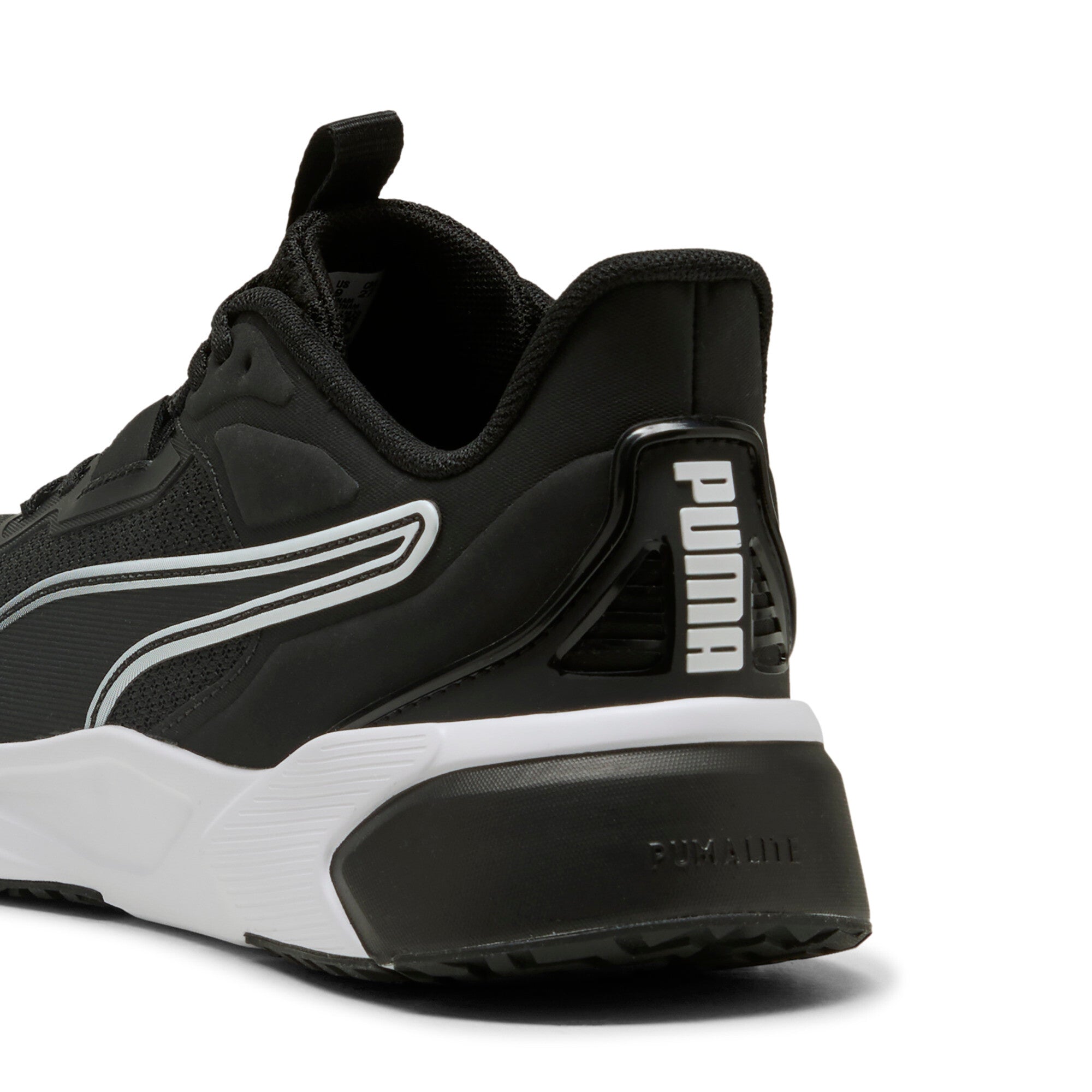 PUMA disperse XT 4 training shoes in black and white — back view