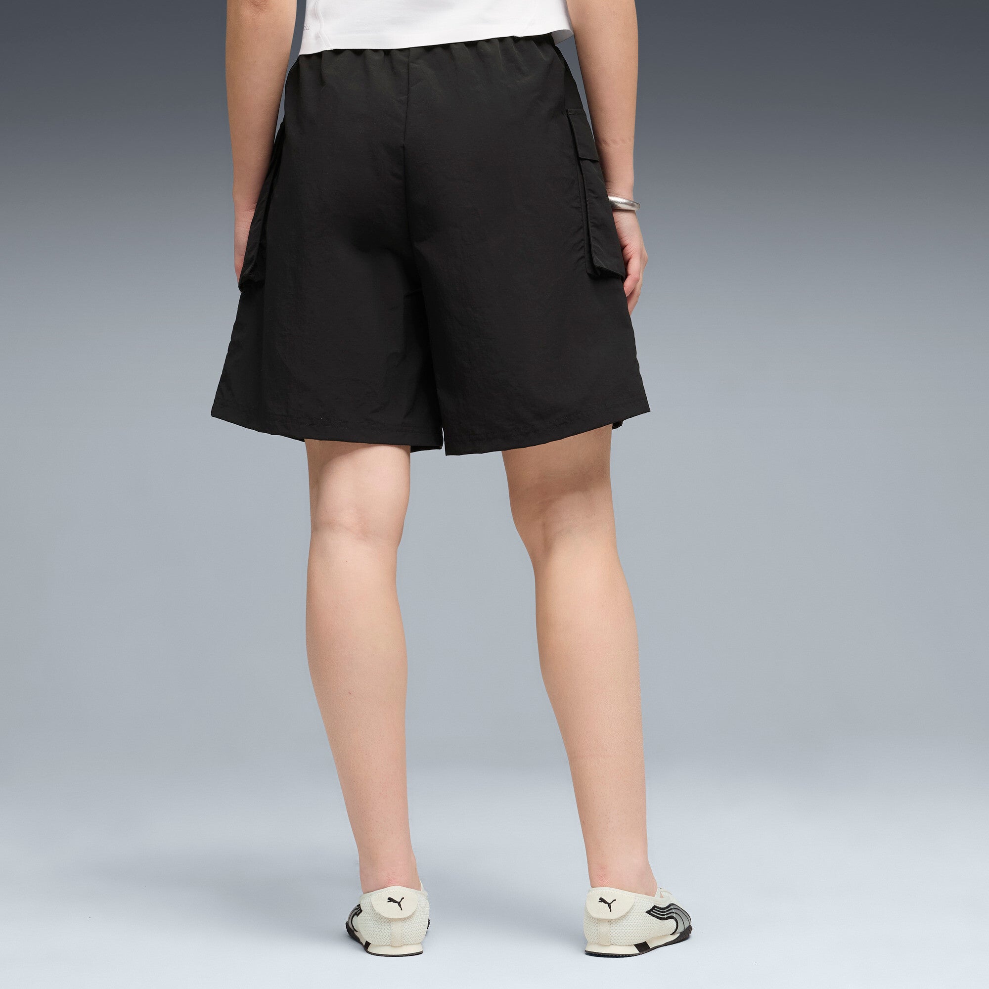 PUMA wardrobe essentials cargo shorts women in black — model shot 2