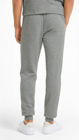 Puma essentials slim men's pants in black - Model Shot 02