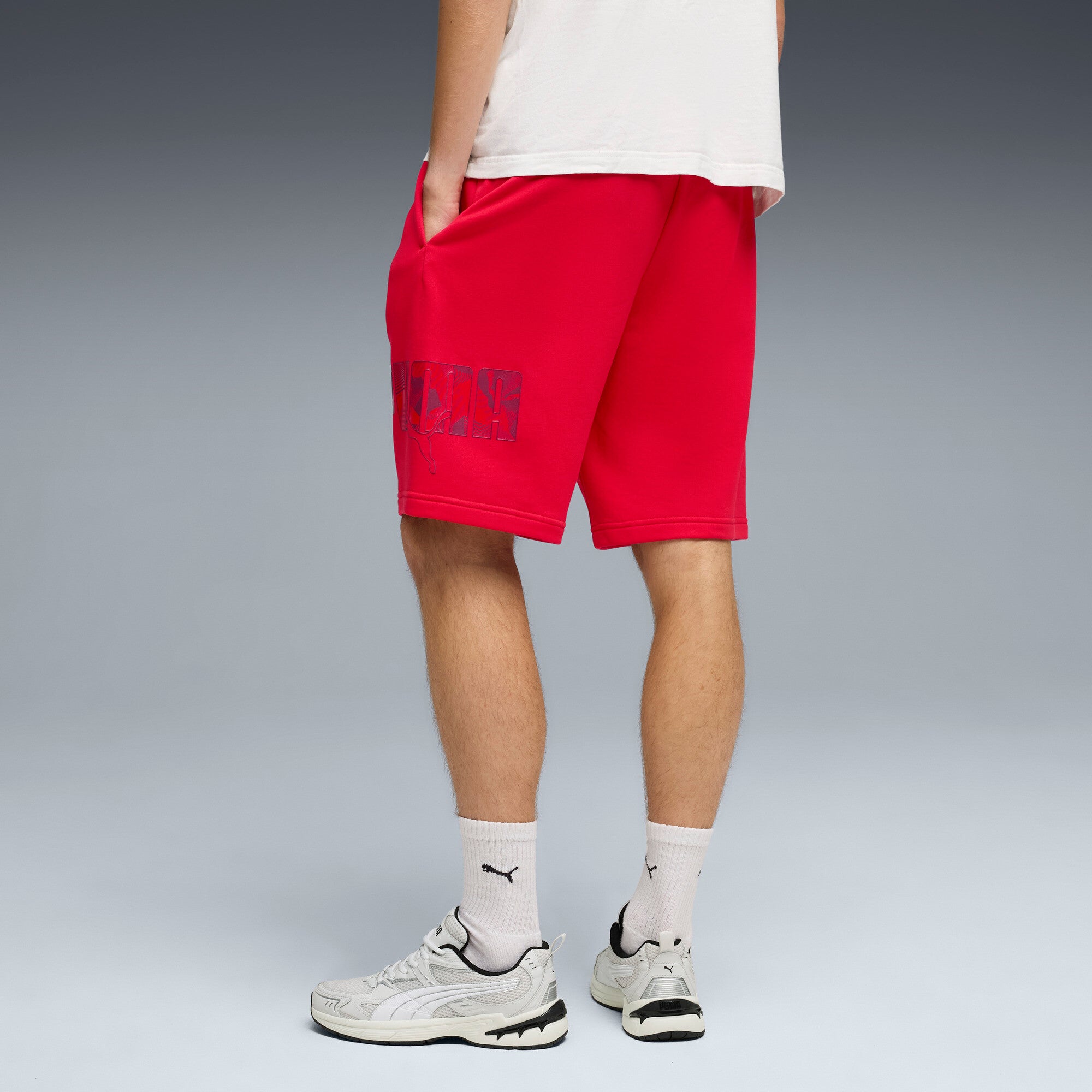 PUMA essentials logo lab 10’’ shorts men in for all time red — model shot 2