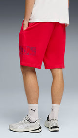 PUMA essentials logo lab 10’’ shorts men in for all time red — model shot 2