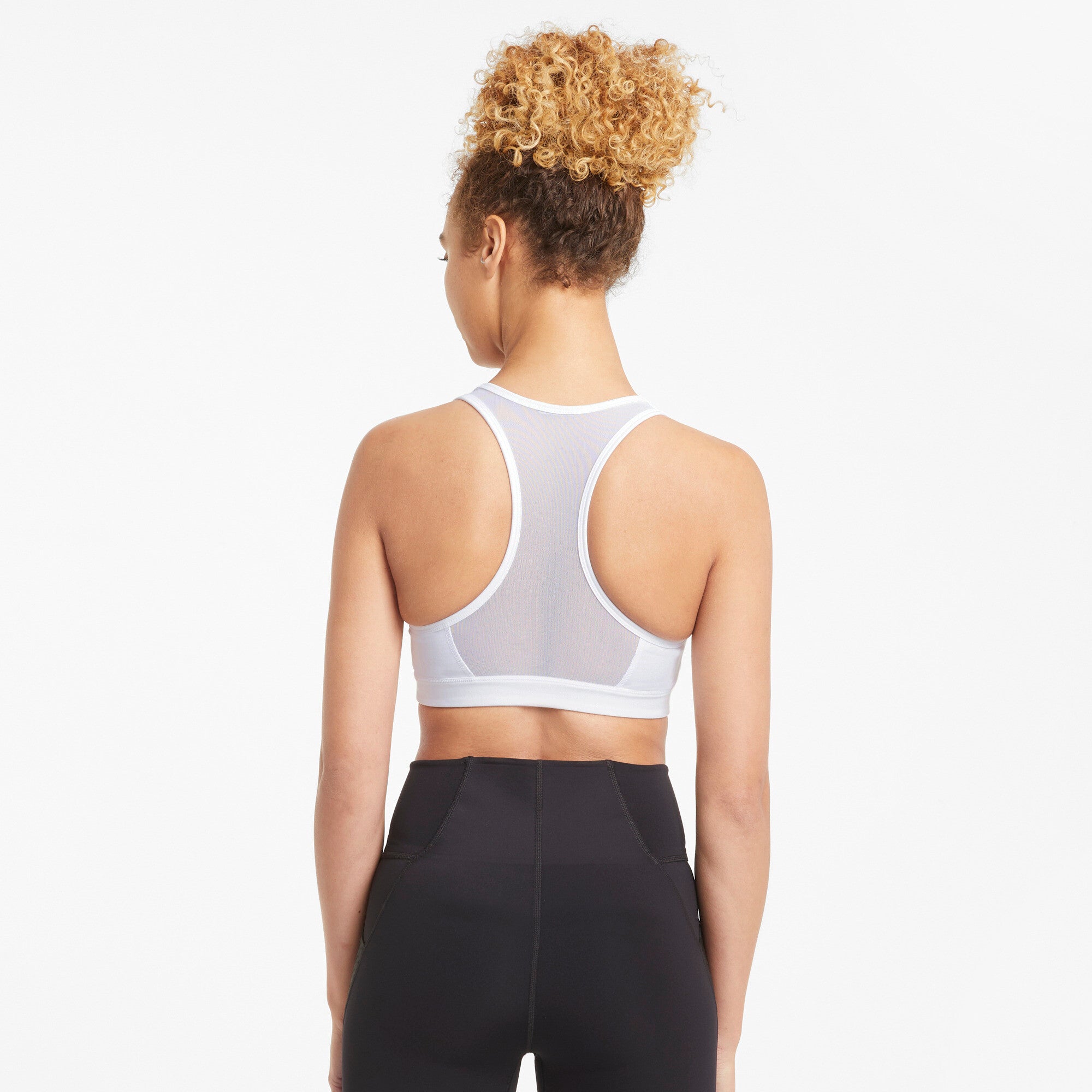 Puma mid impact 4keeps training bra in black - Model Shot 02