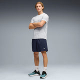 PUMA TRAIN ALL DAY foundations woven 7" shorts men in navy — model shot 3