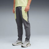 PUMA FLEX STRETCH woven training pants in gray and green