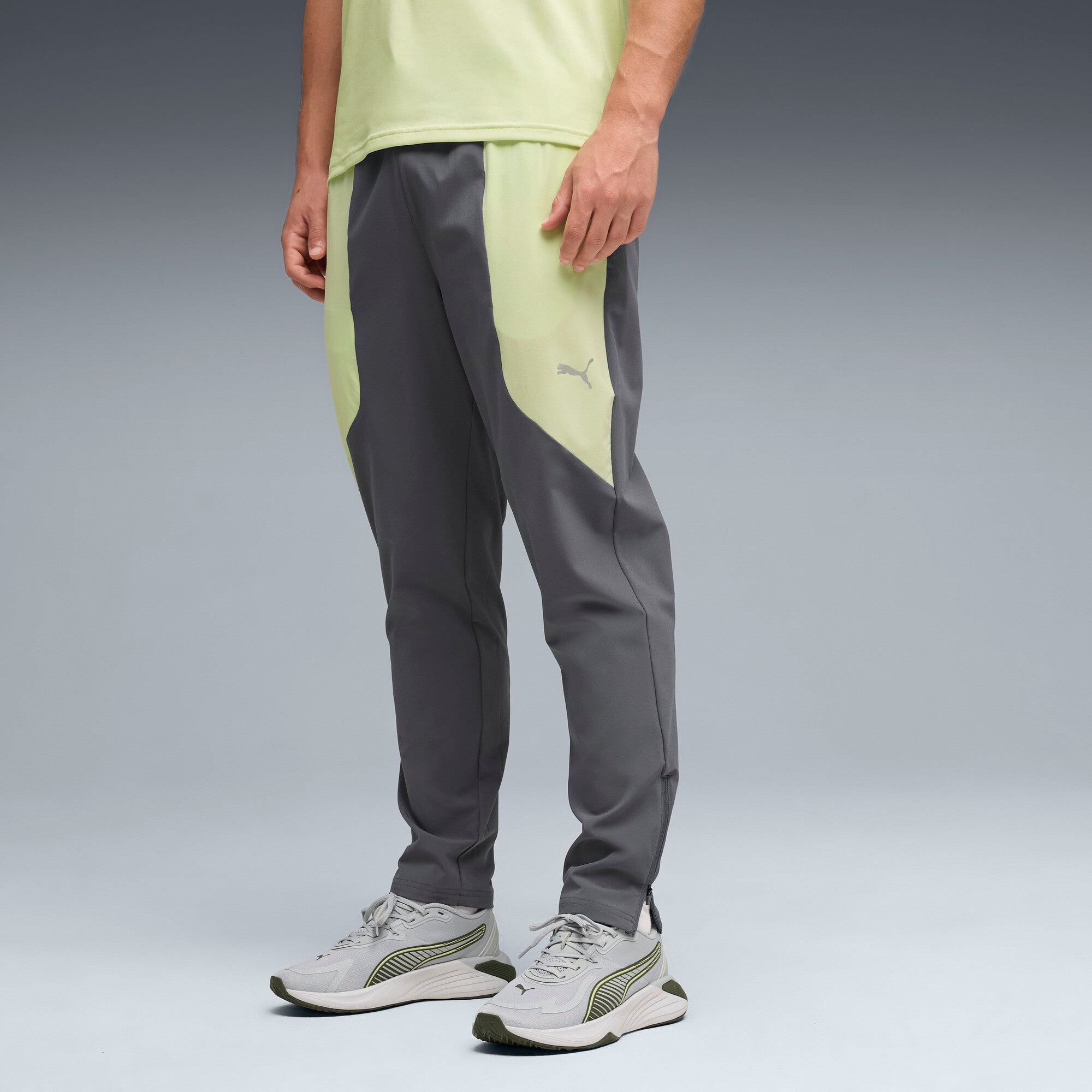 PUMA FLEX STRETCH woven training pants in gray and green