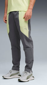 PUMA FLEX STRETCH woven training pants in gray and green