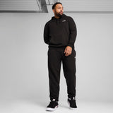 PUMA essentials small no. 1 logo hoodie men in black — model shot 3