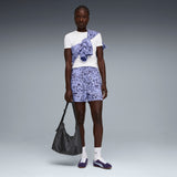 PUMA essentials graphics animal high-rise printed 4" shorts women in intense lavender — model shot 3