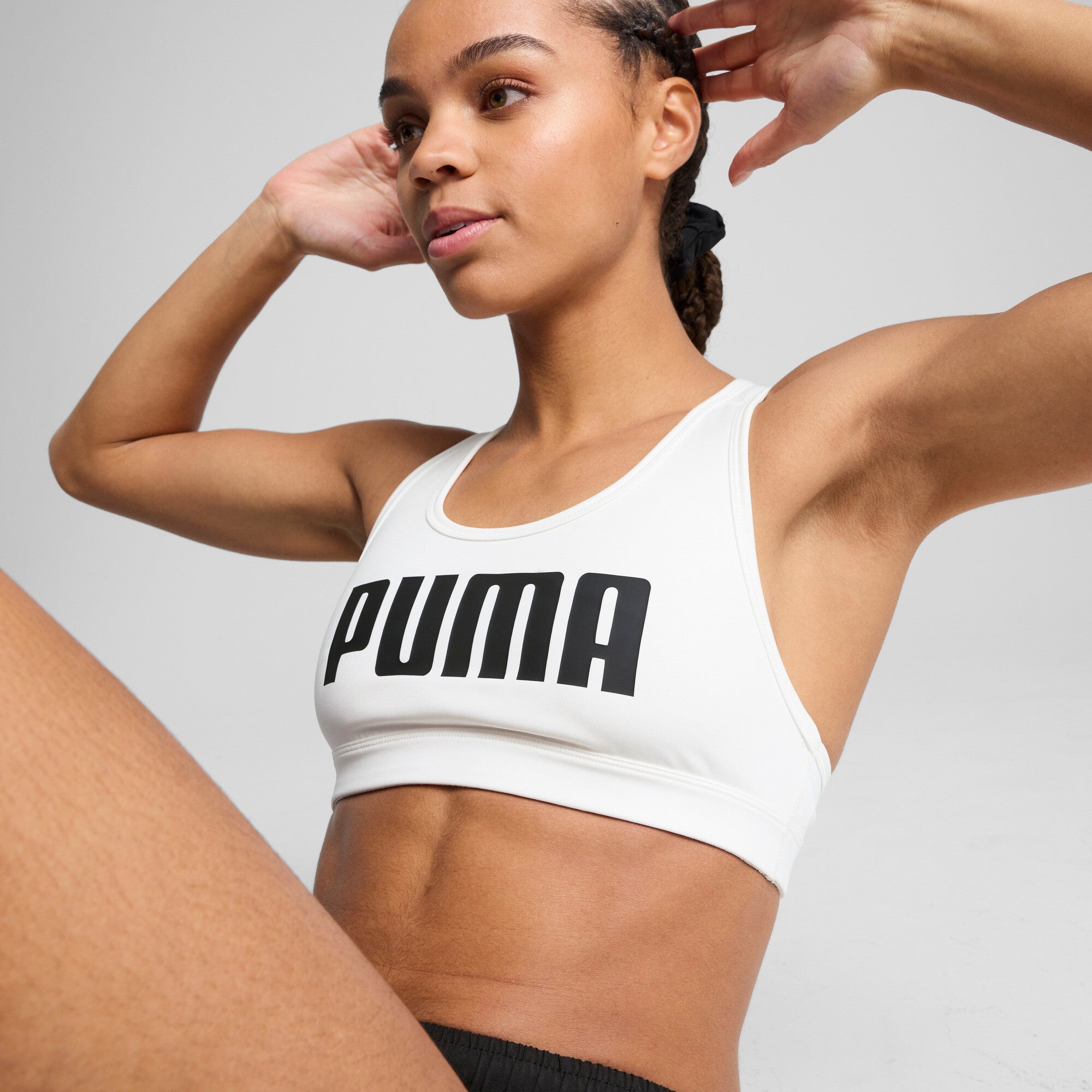 Puma 4keeps bra in white and black - Model Shot 02