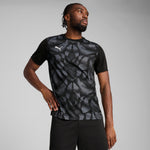 Puma teamULTIMATE football jersey in black and white - Model Shot 01