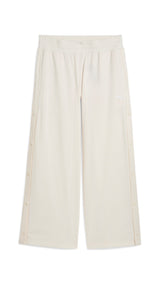Puma wardrobe essentials low rise popper pants in white - Front View