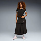 PUMA wardrobe essentials polo women in black — model shot 3