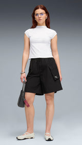 PUMA wardrobe essentials cargo shorts women in black — model shot 3