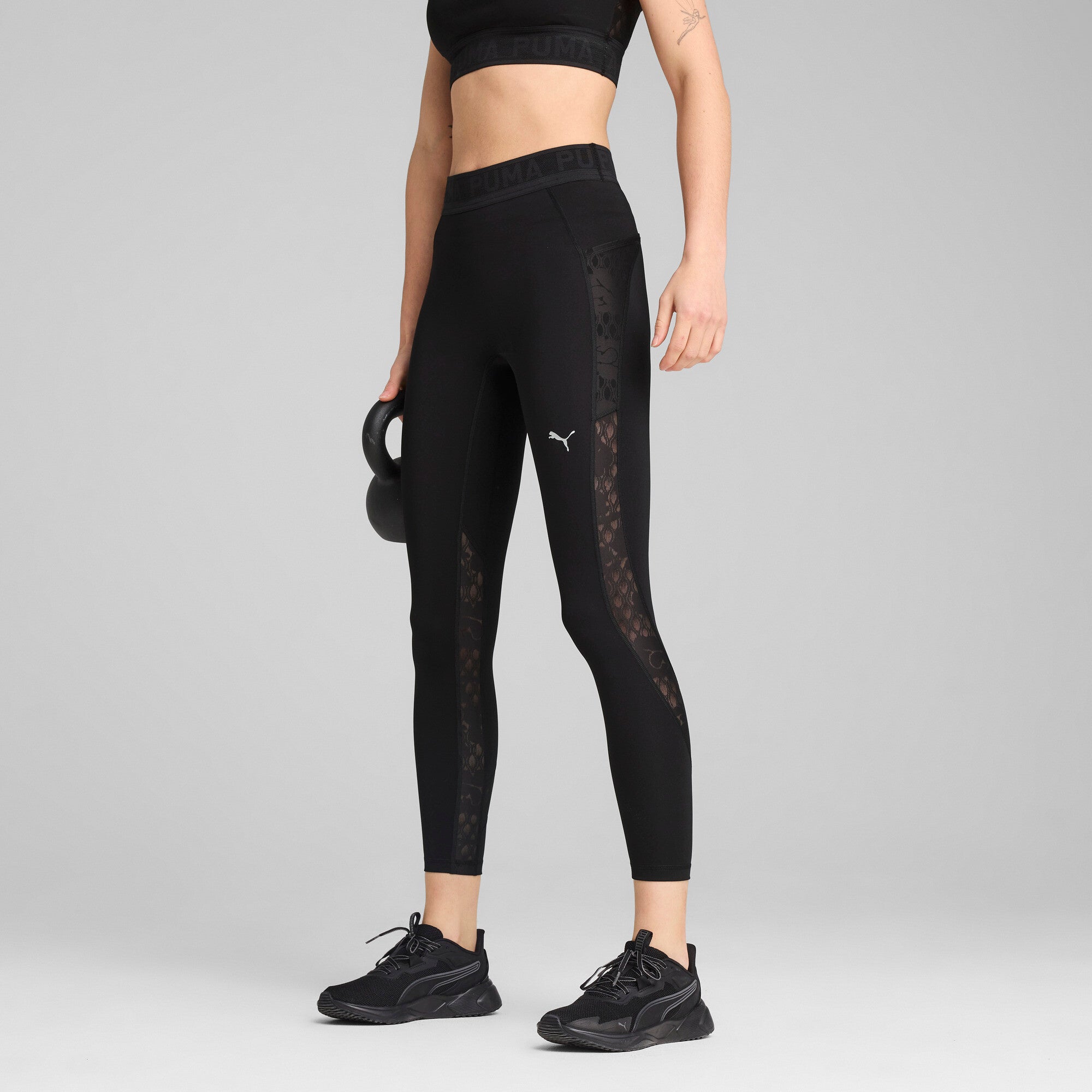 Puma lace high-waisted 7/8 tights in black - Model Shot 01