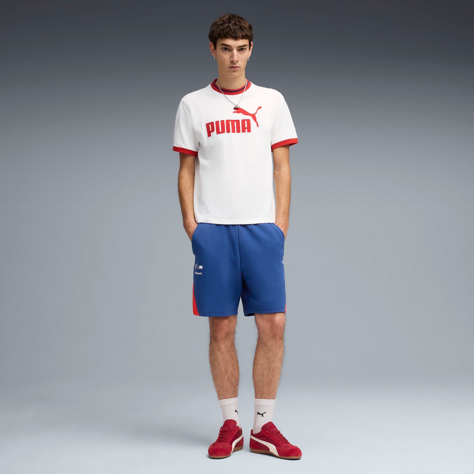 PUMA BMW M MOTORSPORT sportswear 7" shorts men in pro blue — model shot 3