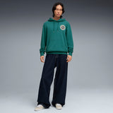 PUMA sunset drive hoodie men in emerald ice — model shot 3