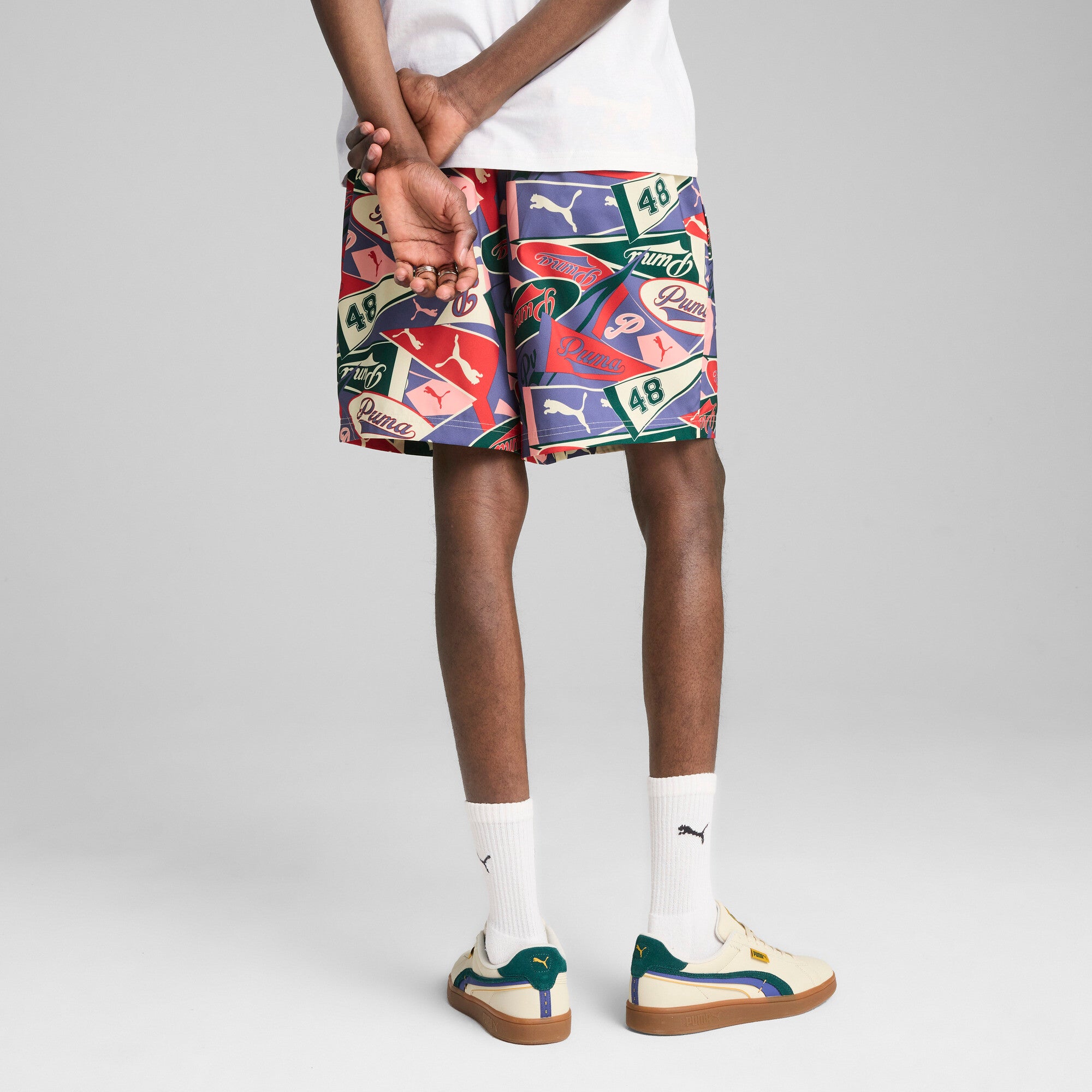 Puma sports legacy graphic relaxed shorts 6'' in blue crystal and aop - Model Shot 02