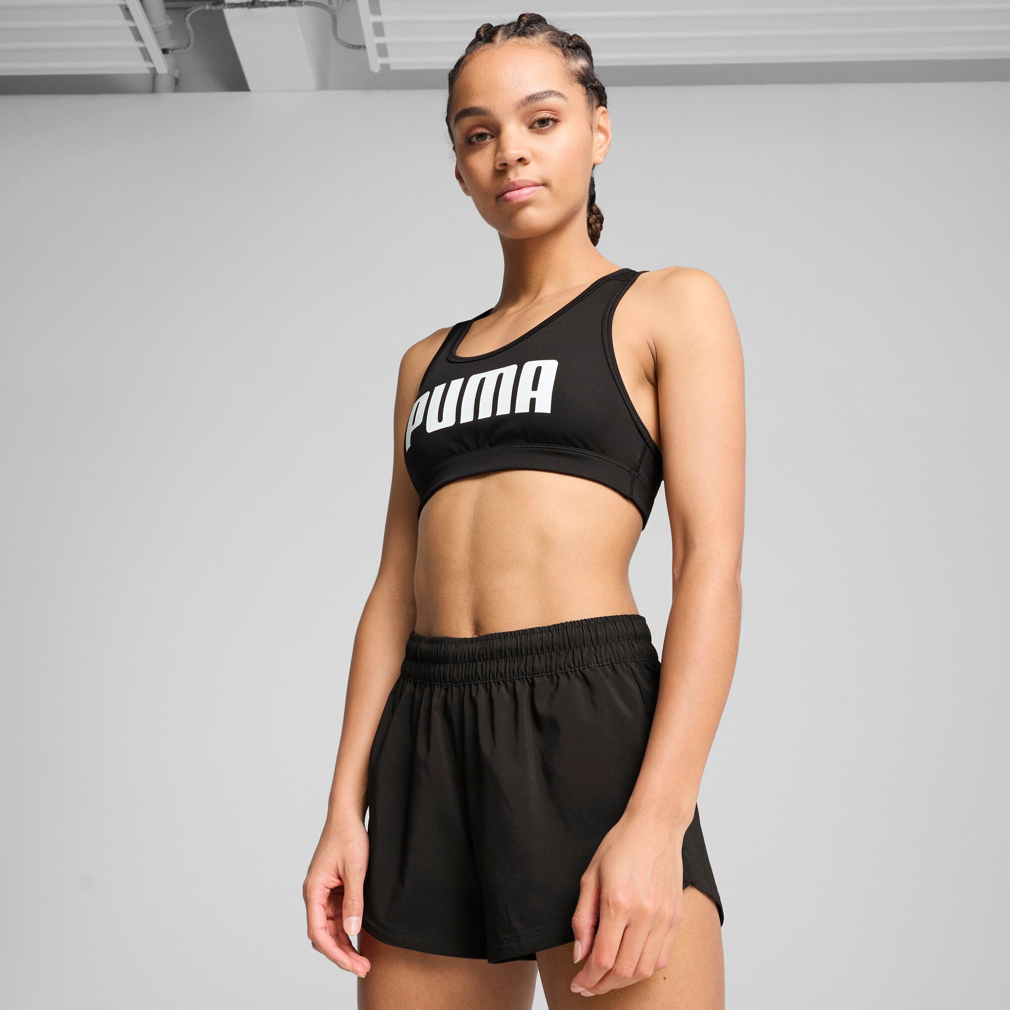 Puma 4keeps bra in black and white - Model Shot 01
