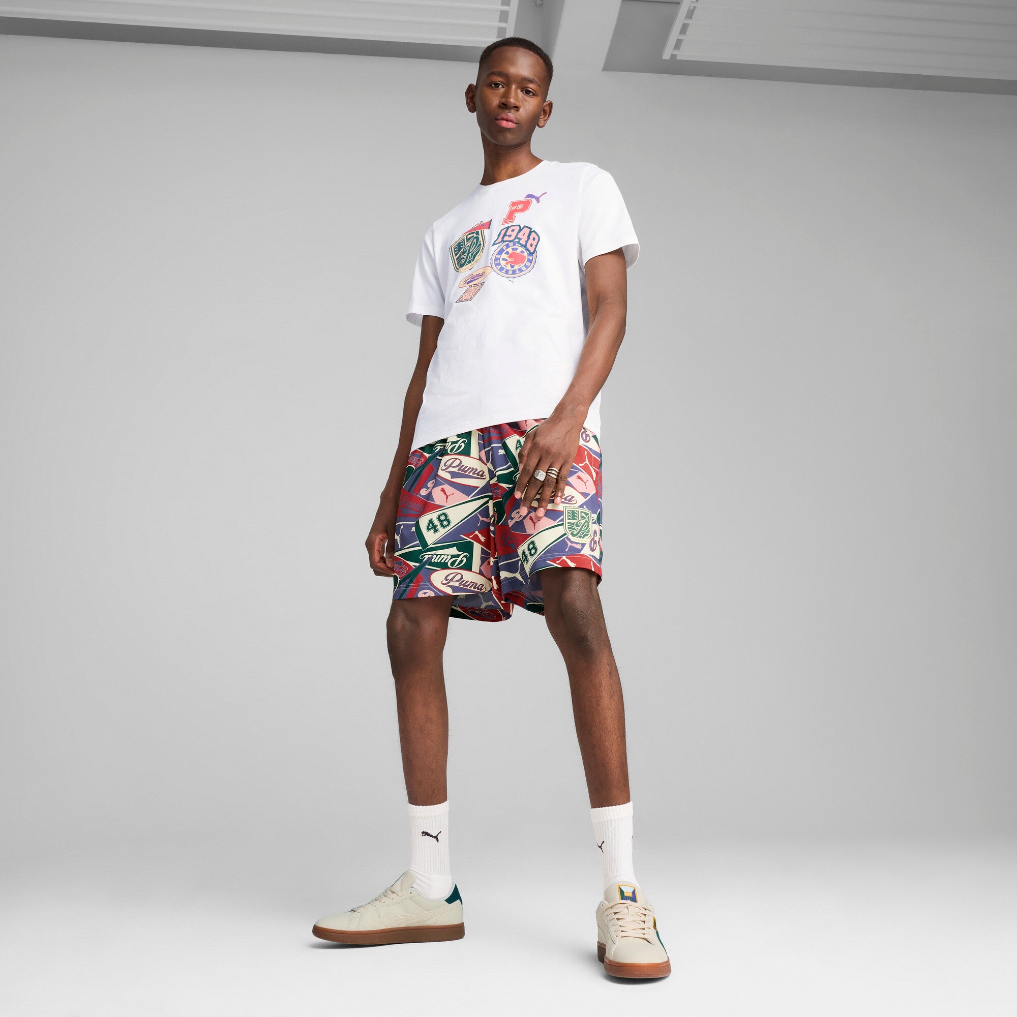 Puma sports legacy graphic relaxed shorts 6'' in blue crystal and aop - Model Shot 03