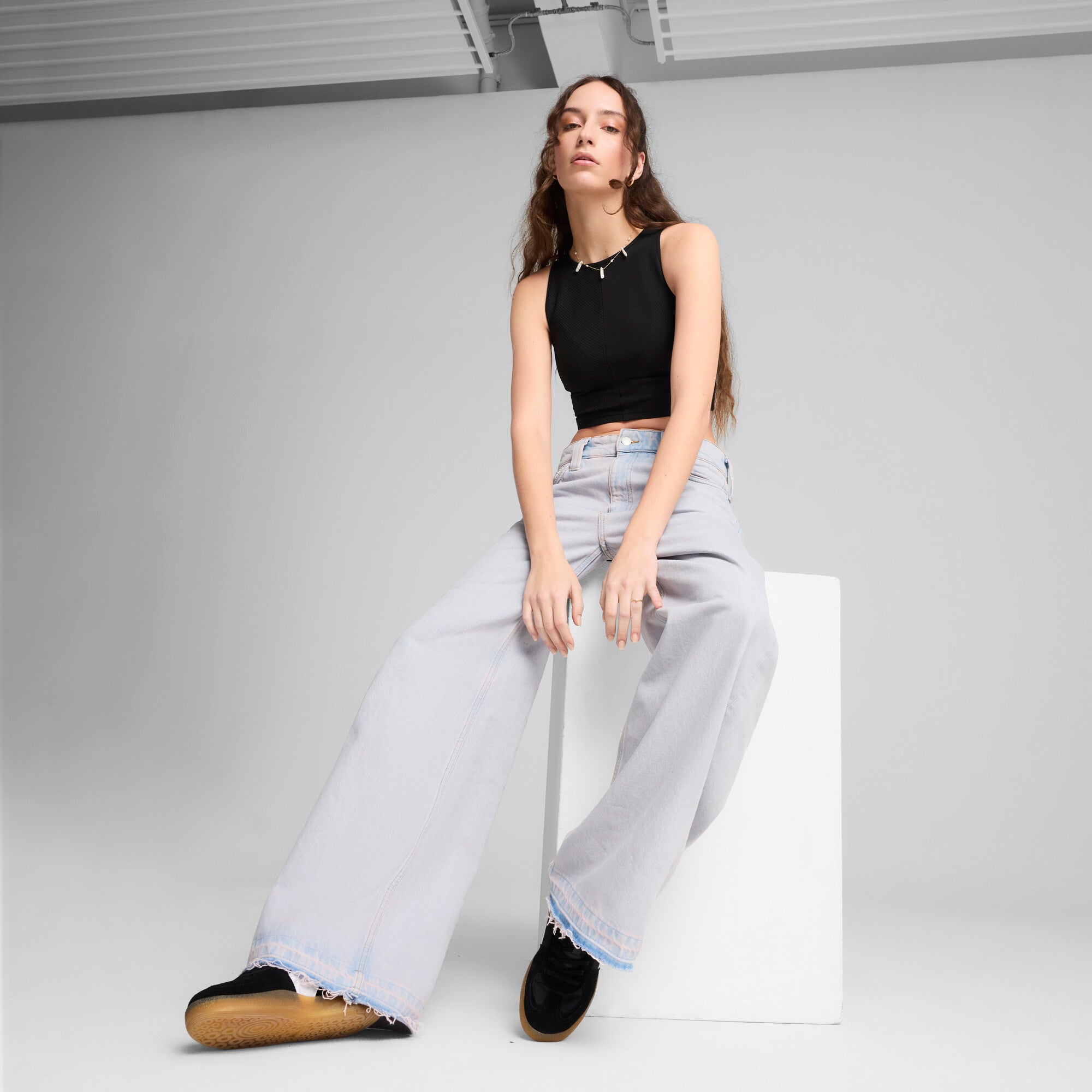 Puma wardrobe essentials ribbed crop top in black - Model Shot 03