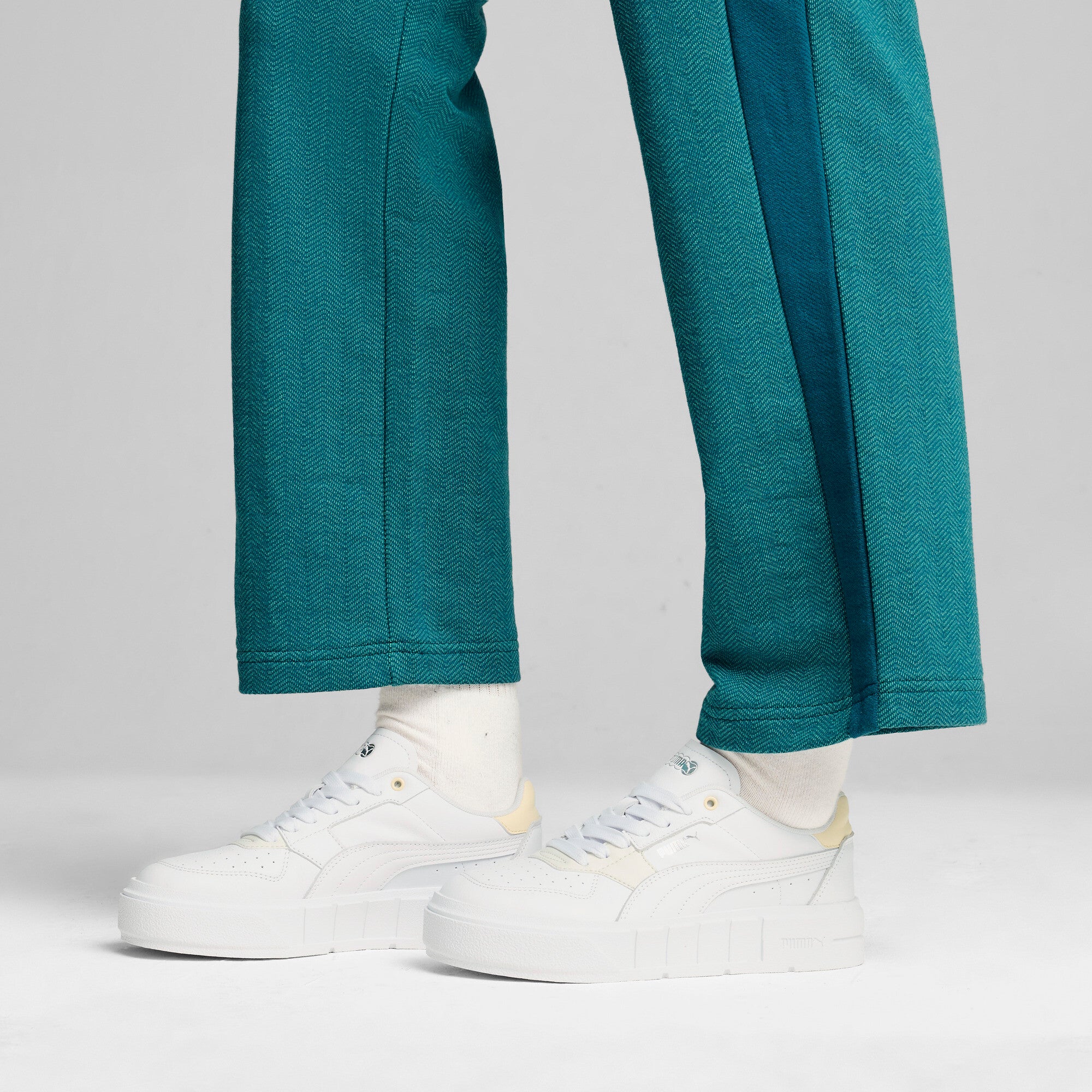 Puma cali court leather sneakers in white and creamy vanilla - Model Shot 01