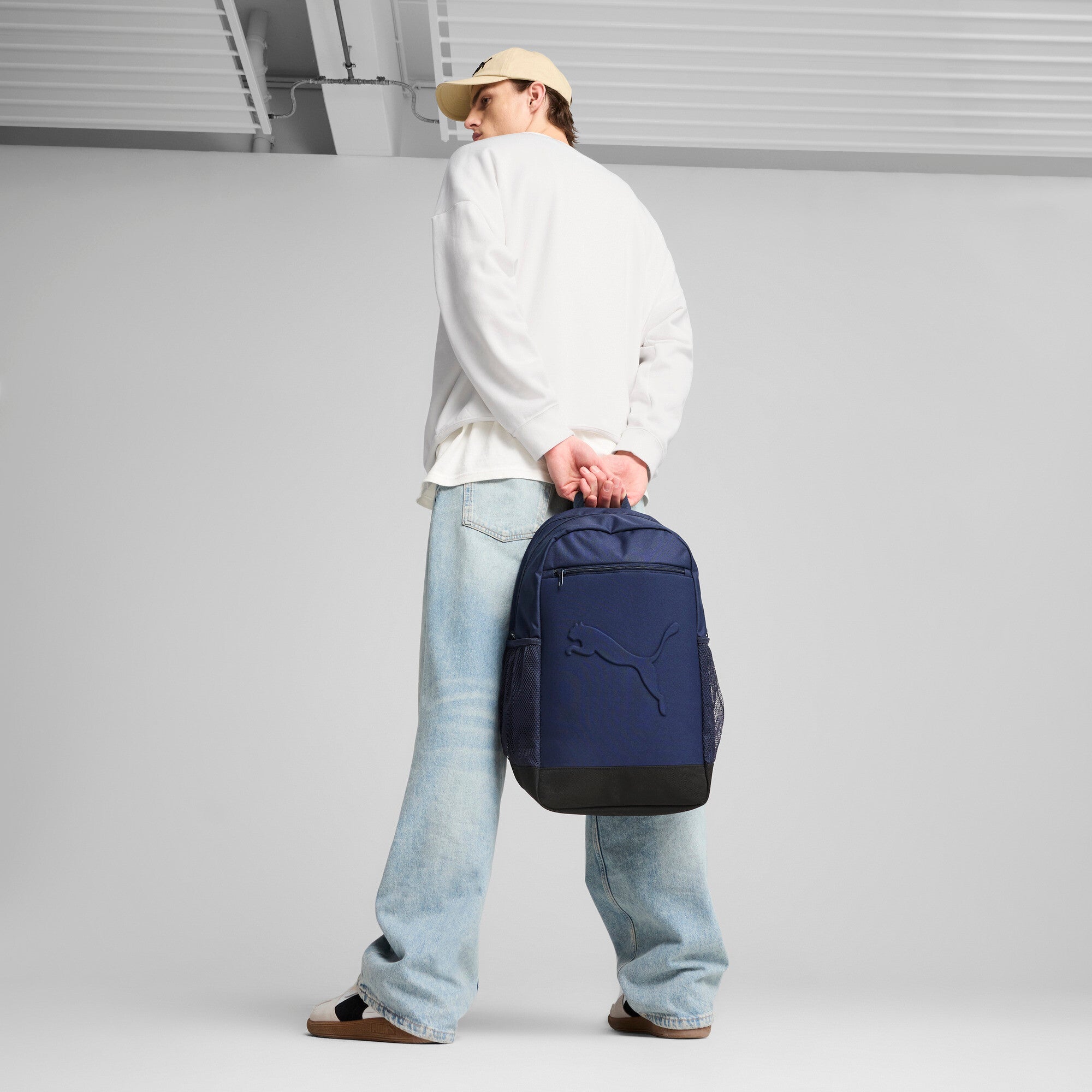 Puma buzz backpack in navy - Model Shot 01