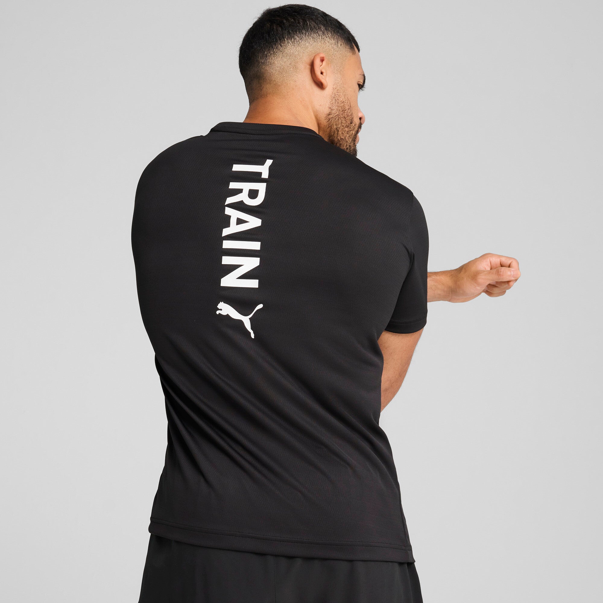 Puma graphics training tee in black - Model Shot 02