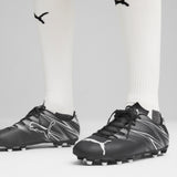 Puma football attacanto fg/ag boots in black - Model Shot 01