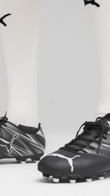 Puma football attacanto fg/ag boots in black - Model Shot 01