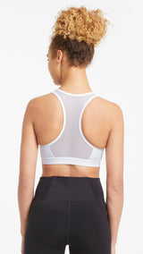 Puma training mid impact 4keeps bra in black - Model Shot 02
